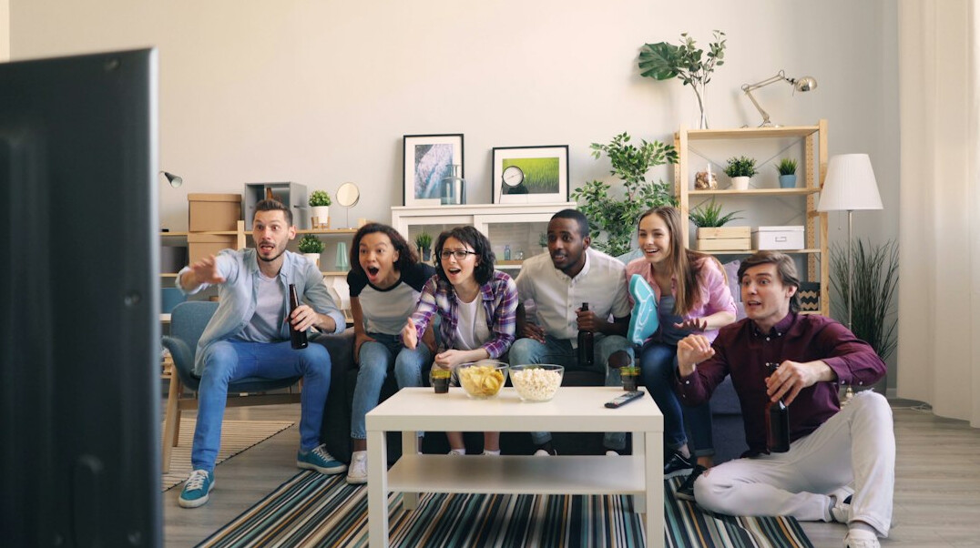 people watching tv together
